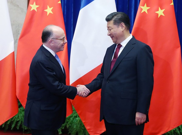 2月22日，国家主席习近平在北京人民大会堂会见法国总理卡泽纳夫。新华社记者 姚大伟 摄